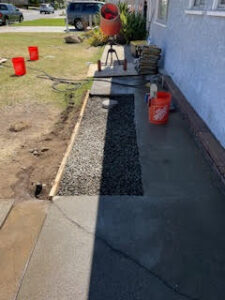 plumber installing yard drainage system in Glendora, CA